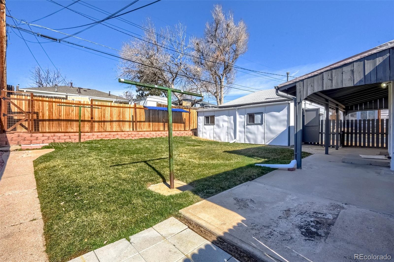 8941 Lilly Drive Thornton, CO 80229 - Photo 26 of 27 a view of a house with a yard