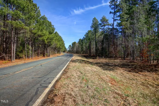 a view of a yard with an trees