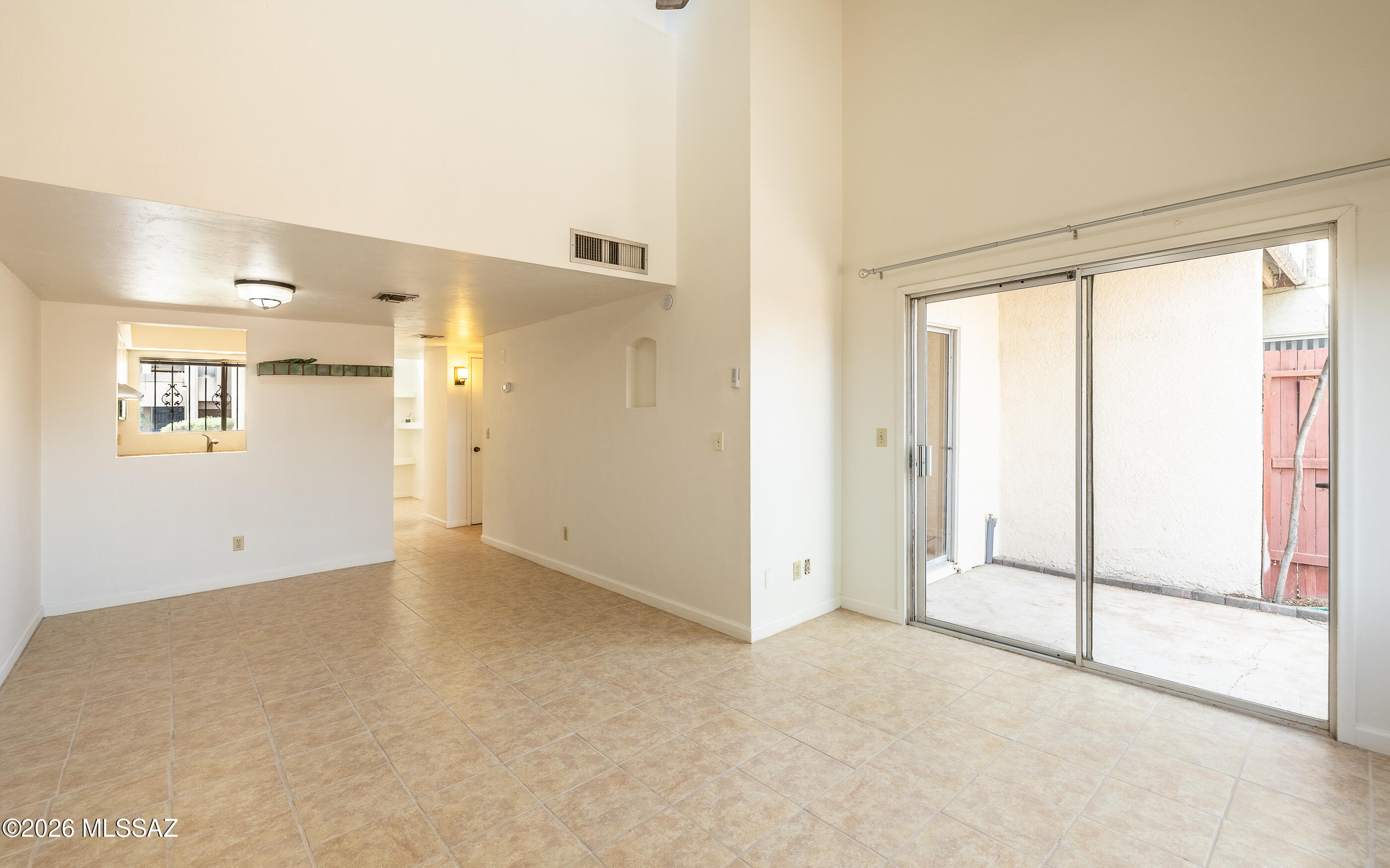 3750 North Country Club Road, Unit 46 Tucson, AZ 85716 - Photo 10 of 34 a view of an empty room with a window