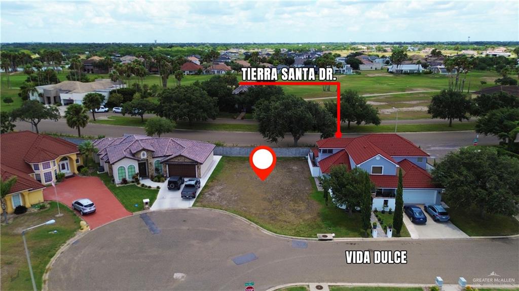 1606 Vida Grande Weslaco, TX 78596 - Photo 6 of 11 an aerial view of a house with yard swimming pool and outdoor seating