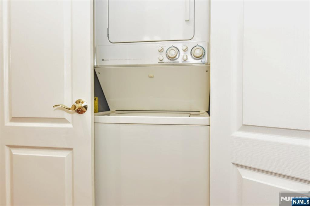 4201 Rio Vista Drive, Unit 4201 Mahwah, NJ 07430 - Photo 18 of 34 a utility room with dryer and washer