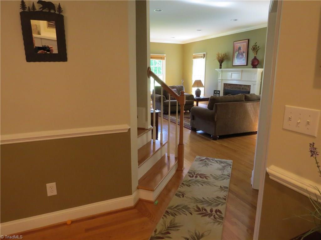 223 Adams Road Mocksville, NC 27028 - Photo 30 of 30 Warm and inviting Hardwood floors throughout the main level plus great flow in the floorplan.