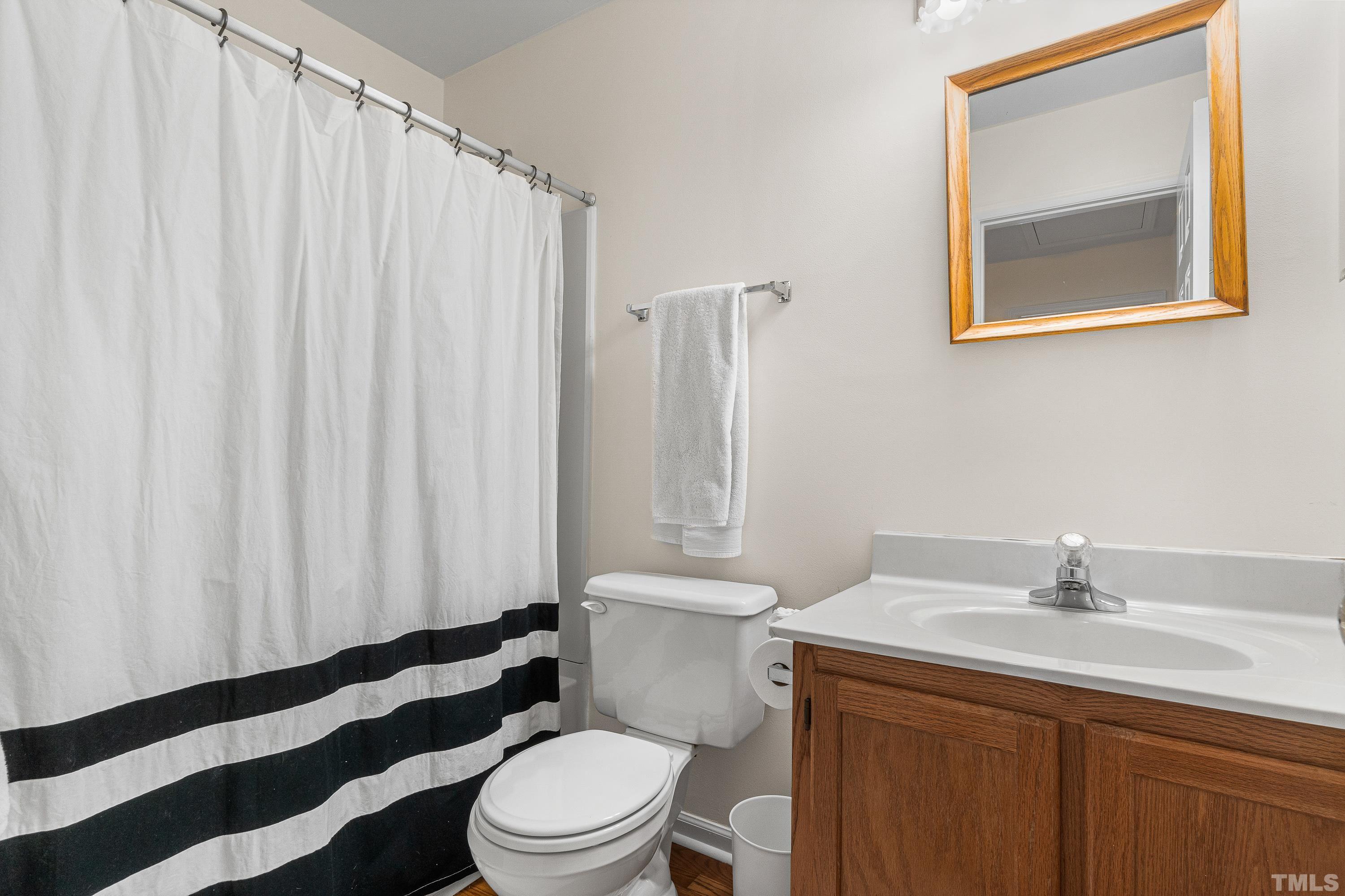 5208 Calverton Drive Raleigh, NC 27613 - Photo 32 of 38 Gallery Image 32