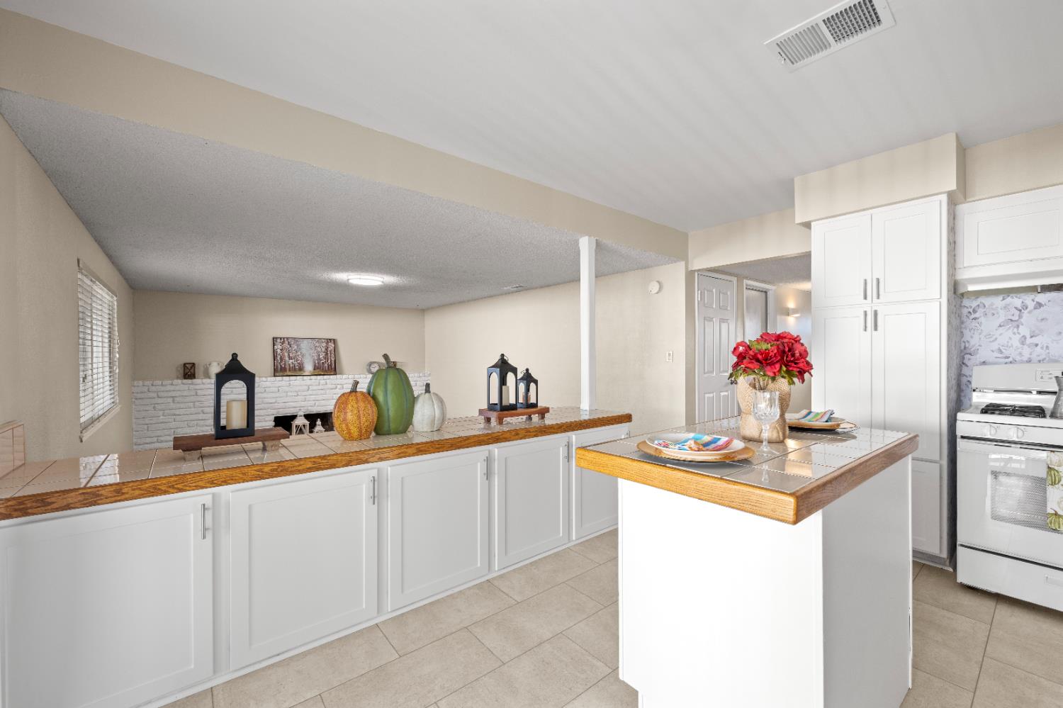 325 Archway Avenue Rio Linda, CA 95673 - Photo 6 of 29 a kitchen with stainless steel appliances granite countertop a sink stove and cabinets