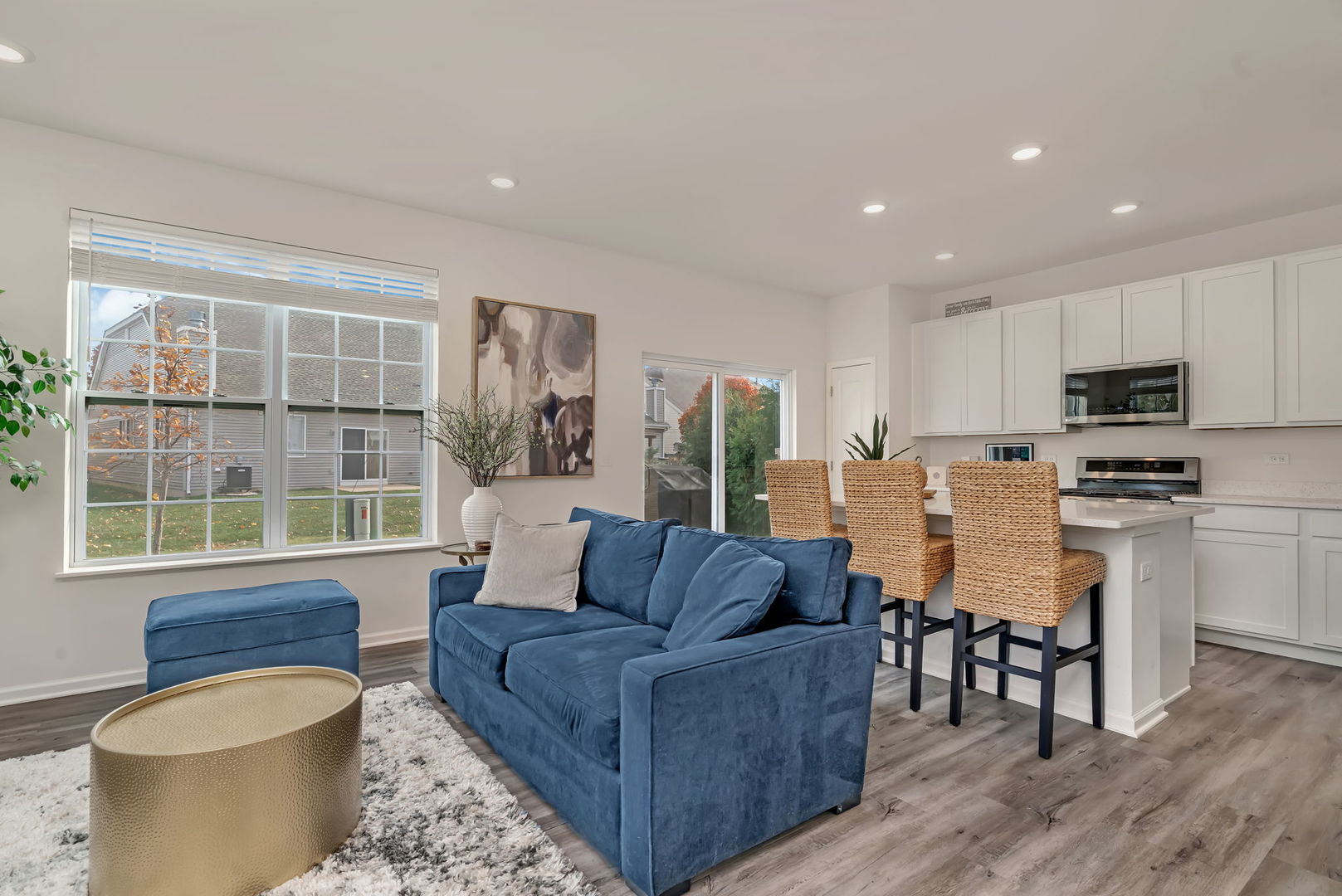 2108 Pembridge Lane Joliet, IL 60431 - Photo 15 of 35 a living room with furniture and a large window