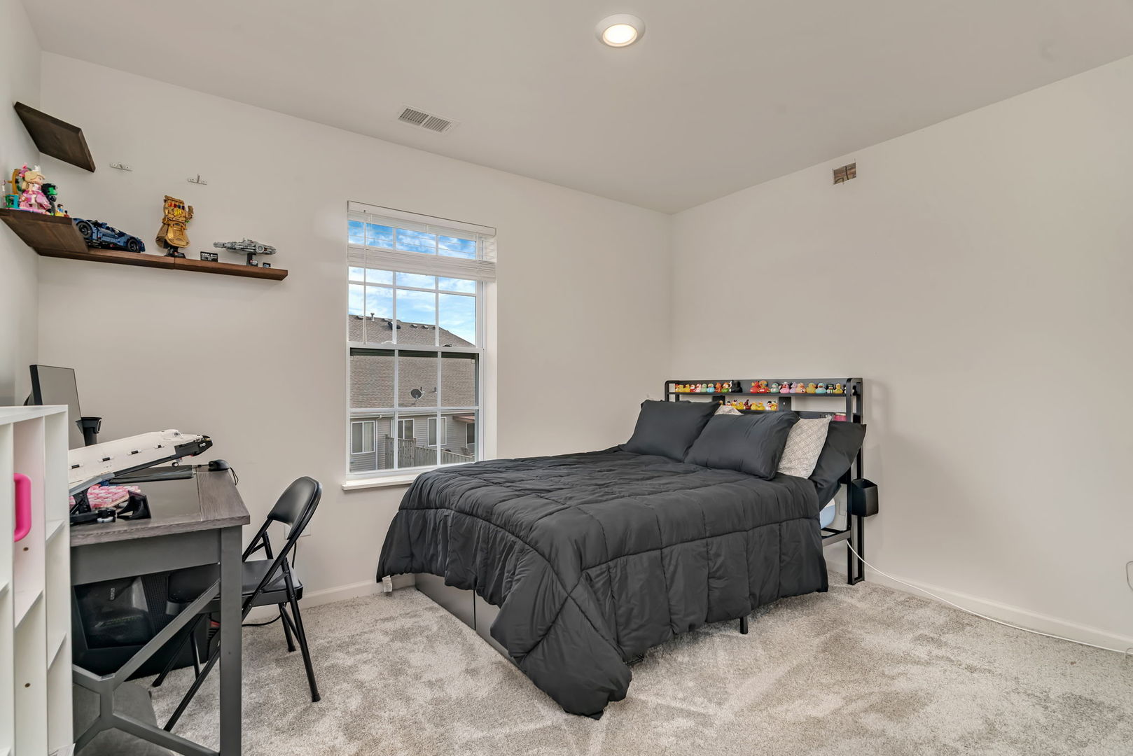 2108 Pembridge Lane Joliet, IL 60431 - Photo 25 of 35 a bedroom with a bed and a window