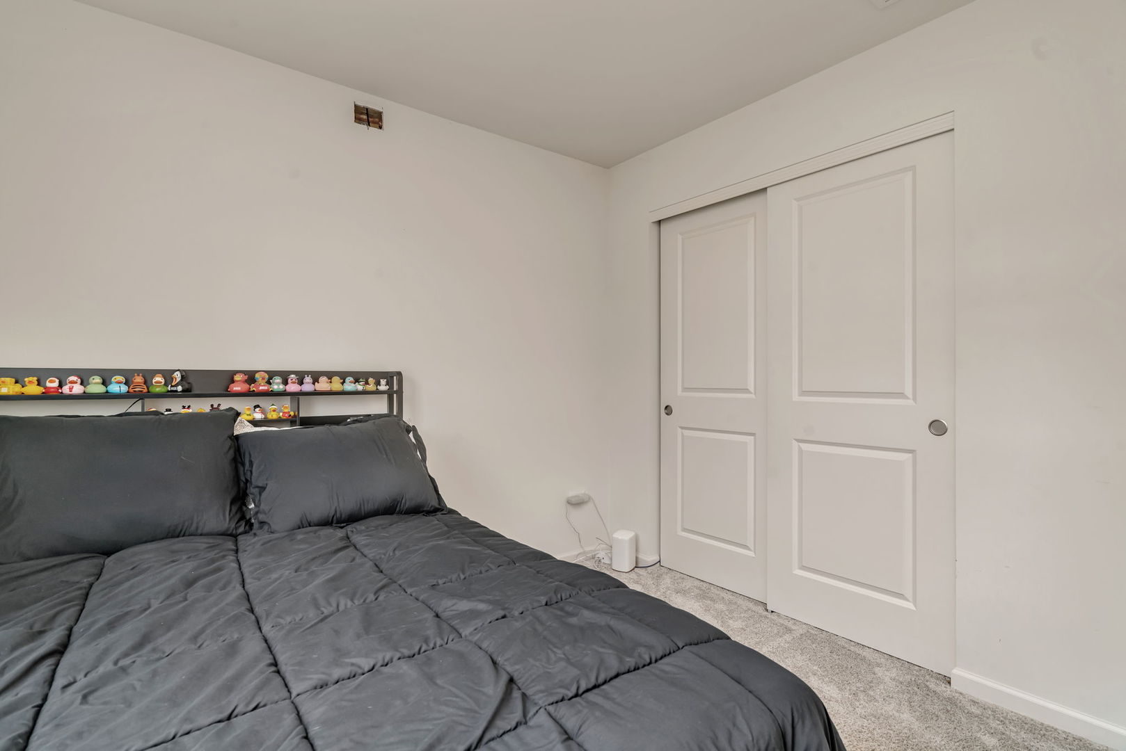 2108 Pembridge Lane Joliet, IL 60431 - Photo 26 of 35 a bedroom with a bed and a window