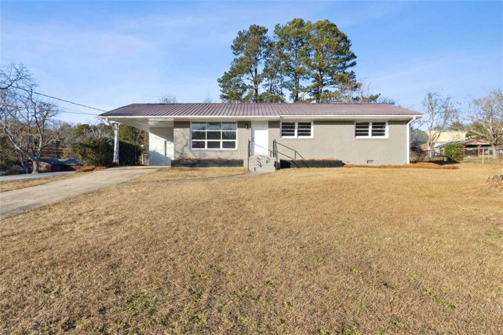 269 Elks Street Winder, GA 30680 - Photo 19 of 42 front view of a house with a yard