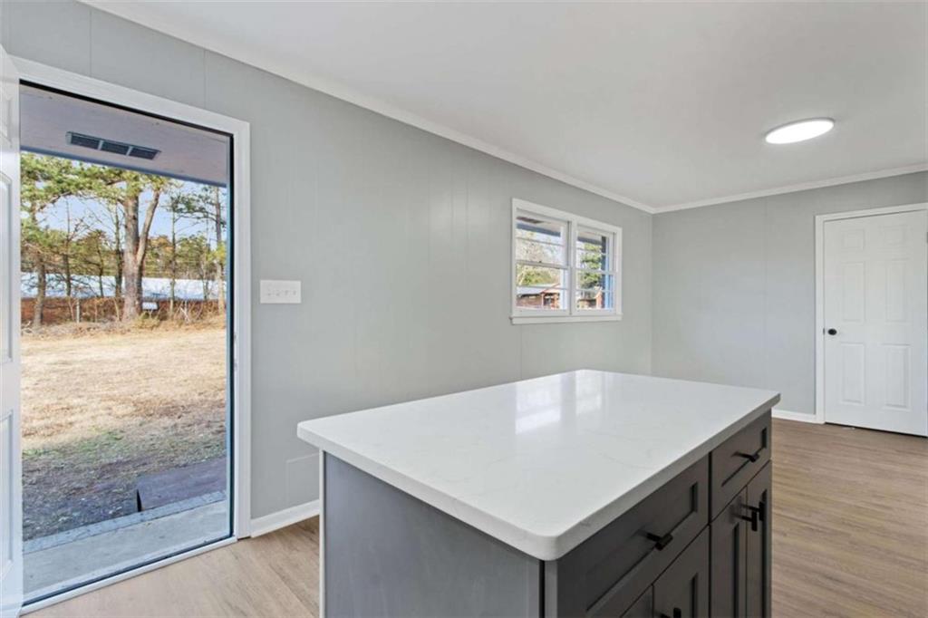 269 Elks Street Winder, GA 30680 - Photo 22 of 42 a view of kitchen with a table and chairs