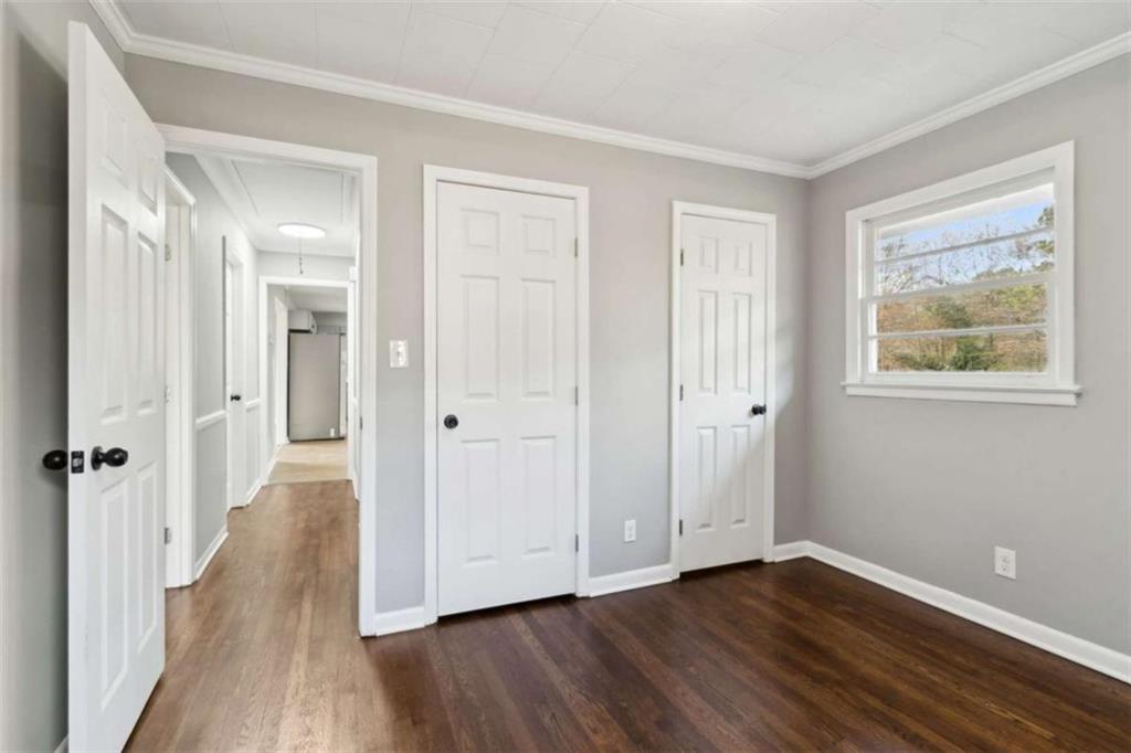 269 Elks Street Winder, GA 30680 - Photo 25 of 42 a view of a room with wooden floor and window