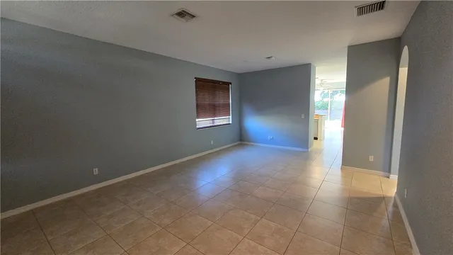 a view of a room with a large window