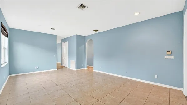 a view of an empty room with window