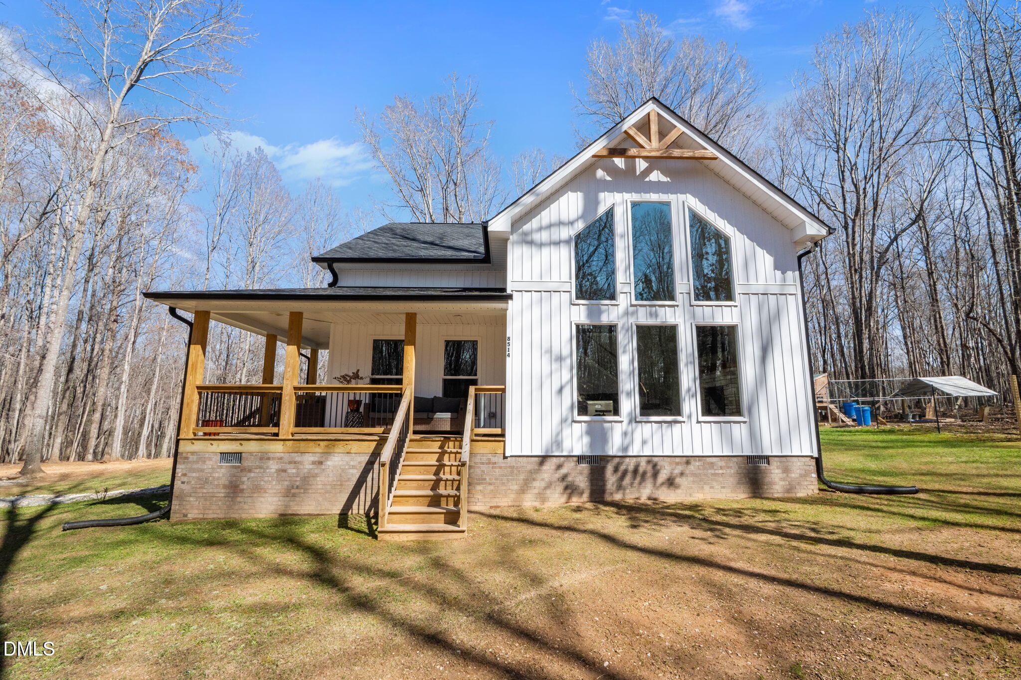 8514 Charlie Stovall Road Roxboro, NC 27574 - Photo 6 of 48 front view of a house with a yard