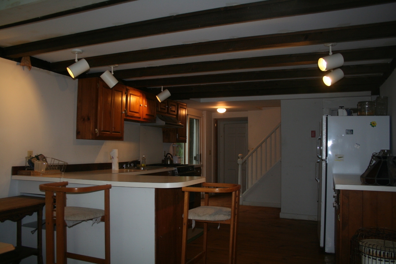 147 Sandisfield Road Sandisfield, MA 01255 - Photo 12 of 26 a kitchen with a sink and cabinets
