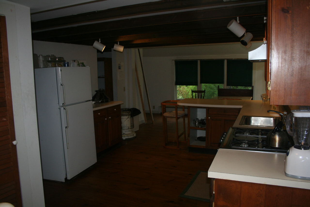 147 Sandisfield Road Sandisfield, MA 01255 - Photo 15 of 26 a kitchen with a refrigerator and a stove top oven