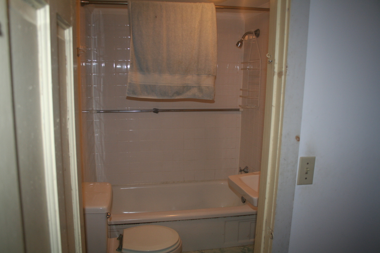 147 Sandisfield Road Sandisfield, MA 01255 - Photo 18 of 26 a bathroom with a granite countertop toilet and a shower