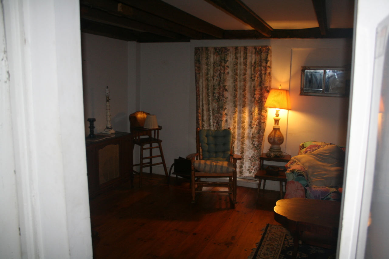 147 Sandisfield Road Sandisfield, MA 01255 - Photo 19 of 26 a living room with furniture and a lamp