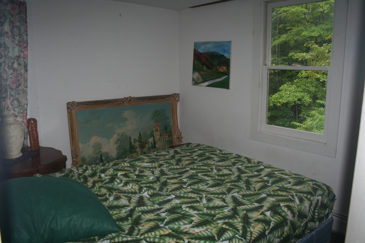 147 Sandisfield Road Sandisfield, MA 01255 - Photo 21 of 26 a bedroom with a bed and a window