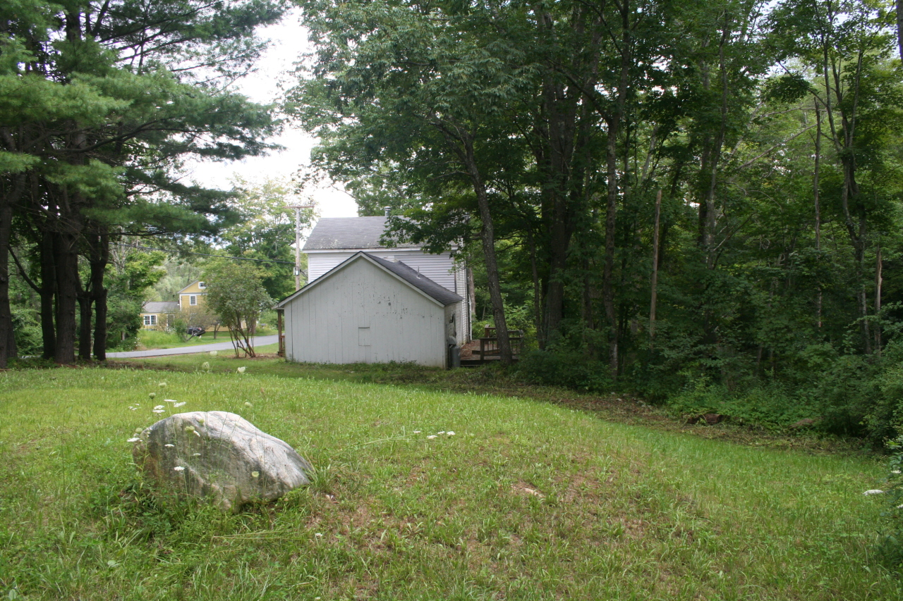147 Sandisfield Road Sandisfield, MA 01255 - Photo 4 of 26 a view of a backyard with large trees