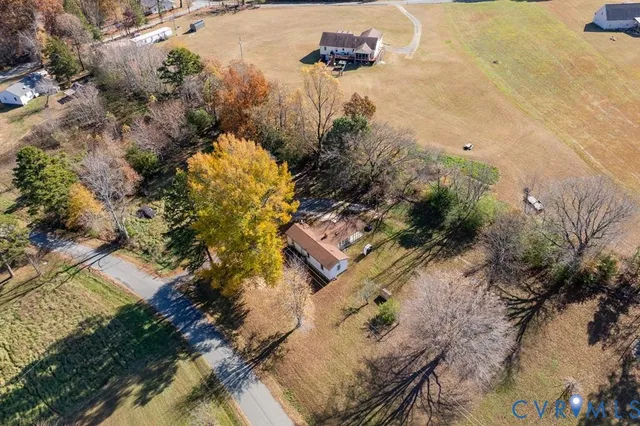 an aerial view of residential house with outdoor space