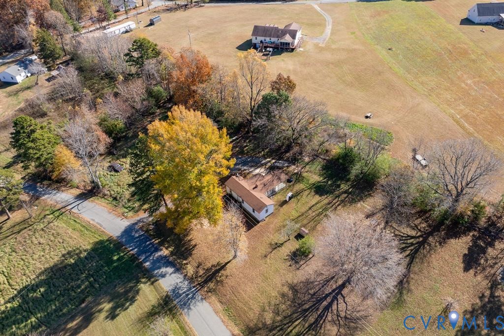 an aerial view of residential house with outdoor space