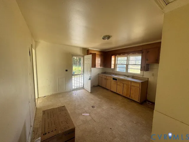 a big room with windows and closet