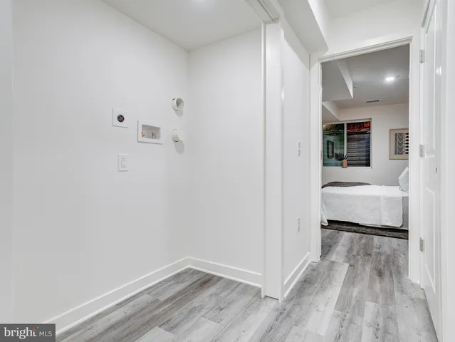 a bedroom with a bed and a view of bathroom