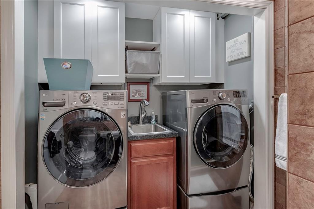 2092 Mercer Road New Brighton, PA 15066 - Photo 19 of 25 Lower level laundry featuring a ton of storage