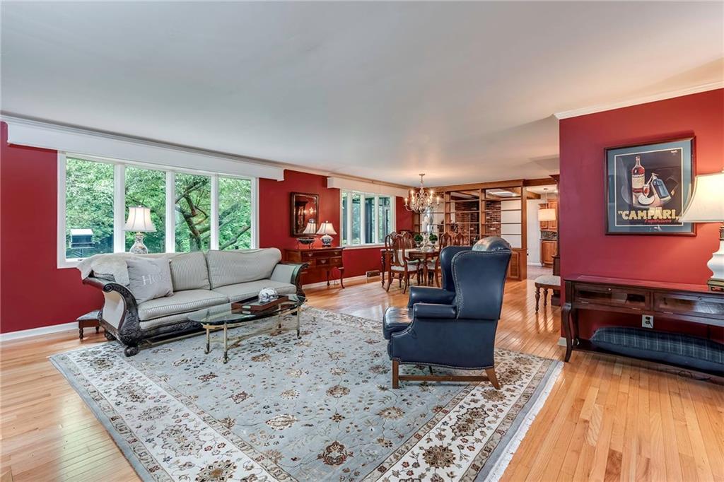 2092 Mercer Road New Brighton, PA 15066 - Photo 3 of 25 Gleaming hardwoods and natural sunlight greet you as you enter into the large, open family room.