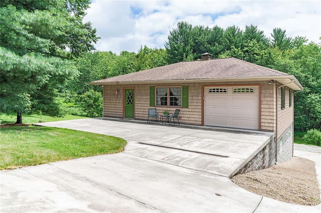 2092 Mercer Road New Brighton, PA 15066 - Photo 22 of 25 This two story detached garage with a finished upper level complete with a pine floor would be an ideal place for entertaining or converting into an in-law's suite