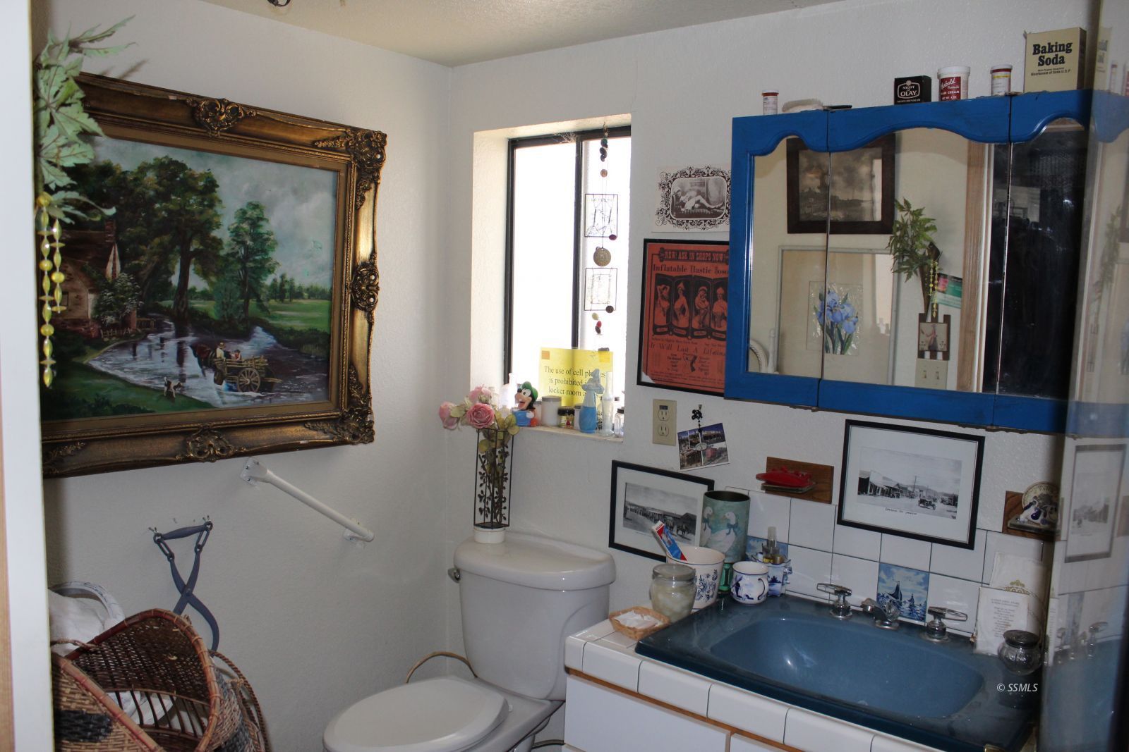 26862 Butte Avenue Randsburg, CA 93554 - Photo 12 of 25 a bathroom with a sink a toilet and a mirror
