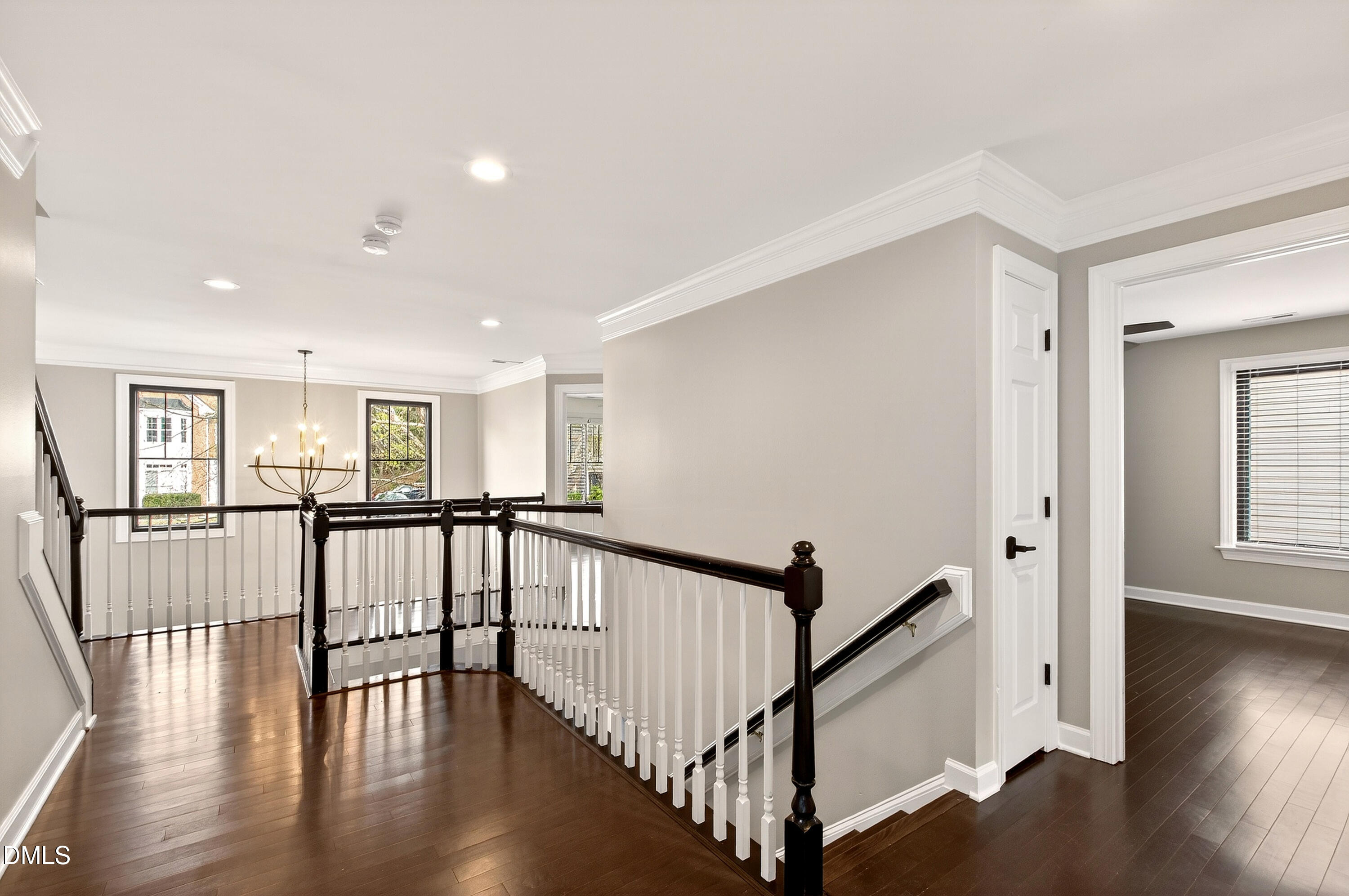 12408 Cilcain Court Raleigh, NC 27614 - Photo 27 of 80 a view of staircase with wooden floor and window