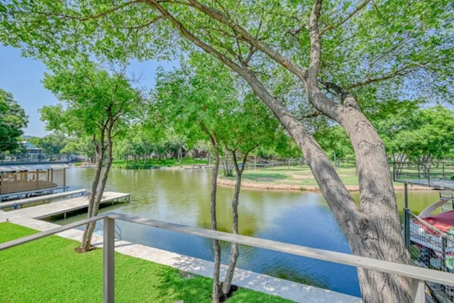 a view of a swimming pool with a patio
