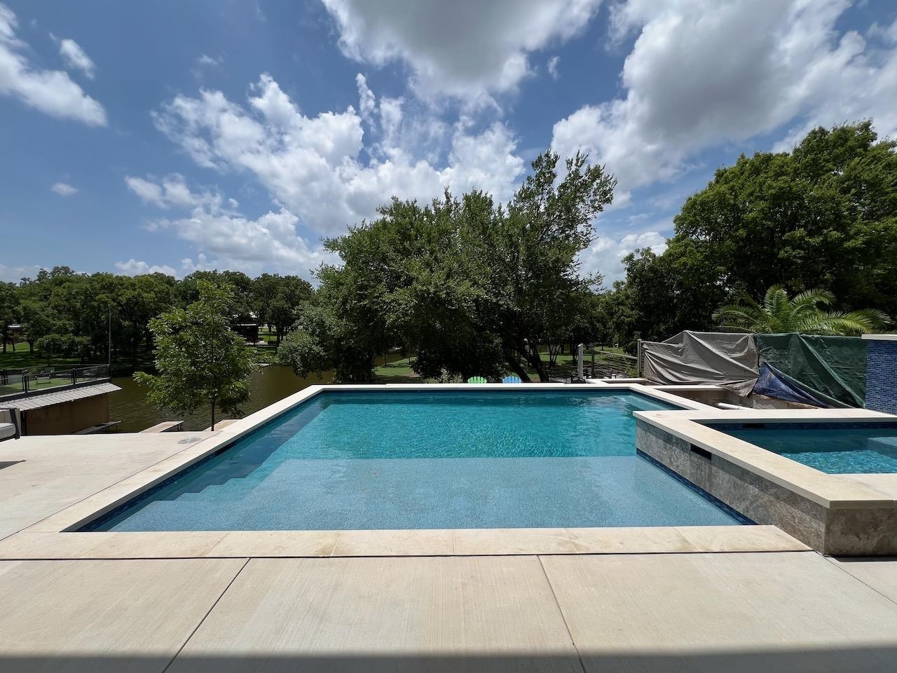 1018 River Road Burnet, TX 78611 - Photo 5 of 29 a view of swimming pool with chairs