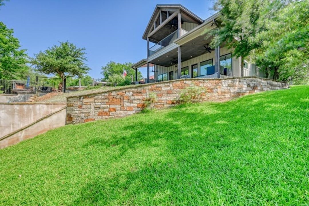 1018 River Road Burnet, TX 78611 - Photo 7 of 29 a view of house with outdoor space and garden