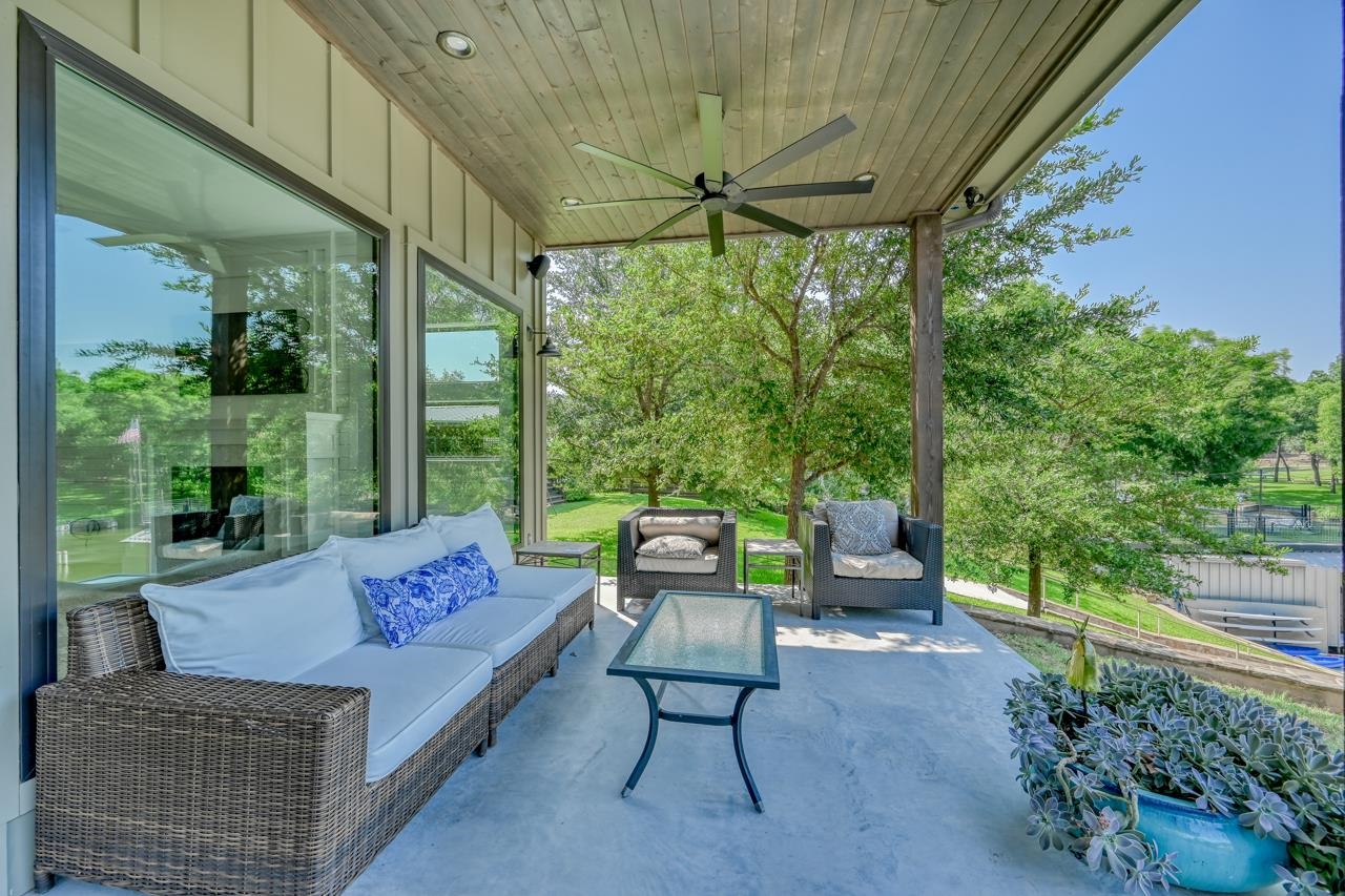 1018 River Road Burnet, TX 78611 - Photo 8 of 29 a balcony with furniture and garden view