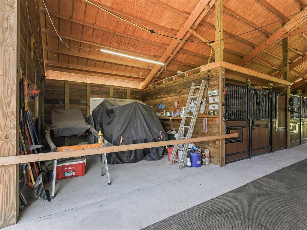 7041 Northeast 22nd Ct Road Ocala, FL 34479 - Photo 69 of 73 a view of storage and utility room