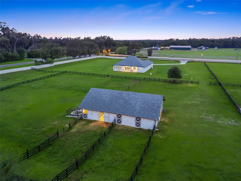7041 Northeast 22nd Ct Road Ocala, FL 34479 - Photo 9 of 73 a view of a house with a yard