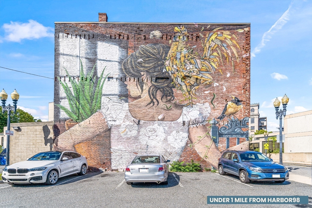 98 Lynnway Lynn, MA 01902 - Photo 16 of 22 a car parked in front of a building