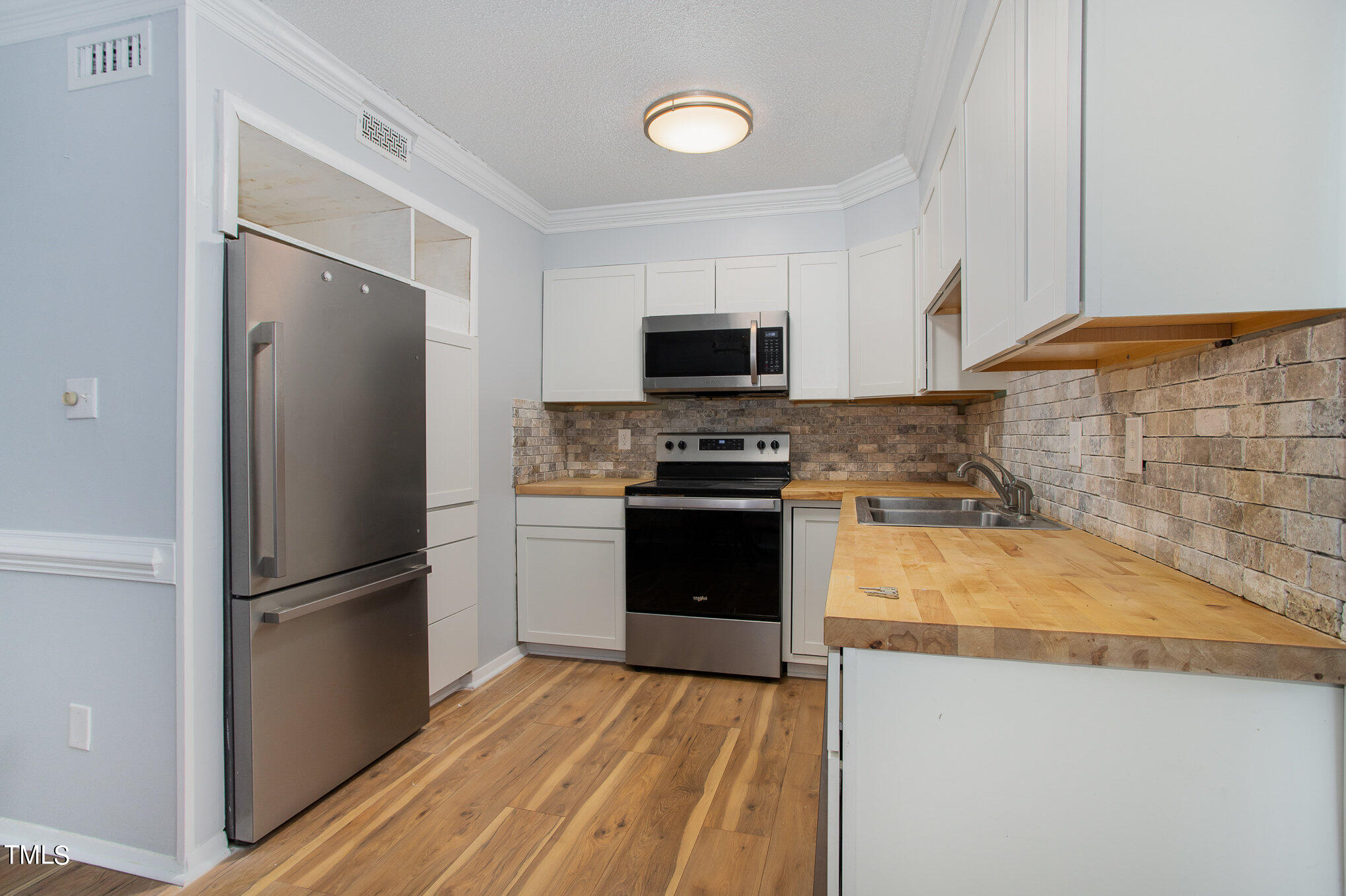 5602 Falls Of Neuse Road, Unit G Raleigh, NC 27609 - Photo 6 of 21 010_img_0292-edit