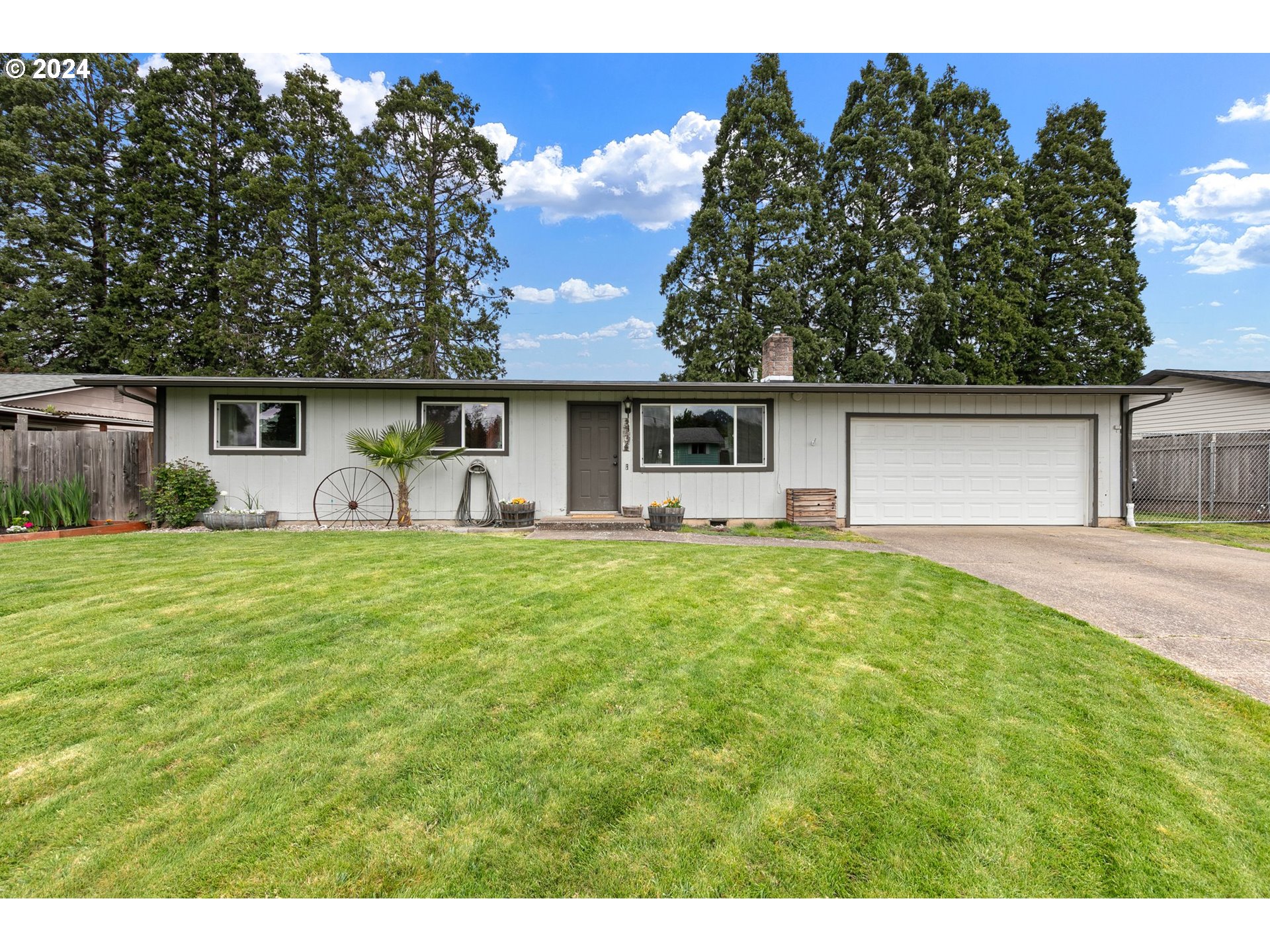 3734 Cherokee Drive Springfield, OR 97478 - Photo 1 of 39 a front view of house with yard and green space