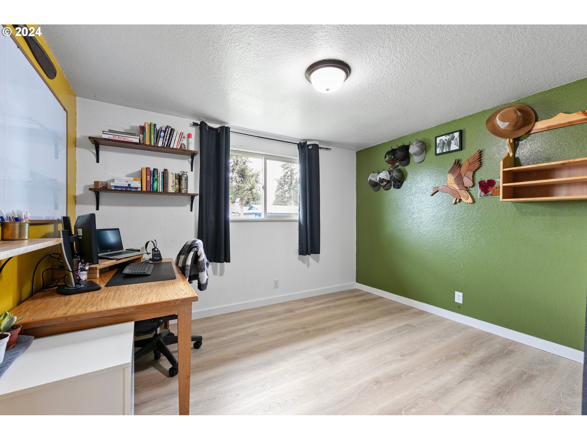 3734 Cherokee Drive Springfield, OR 97478 - Photo 27 of 39 a view of a workspace with furniture and a window
