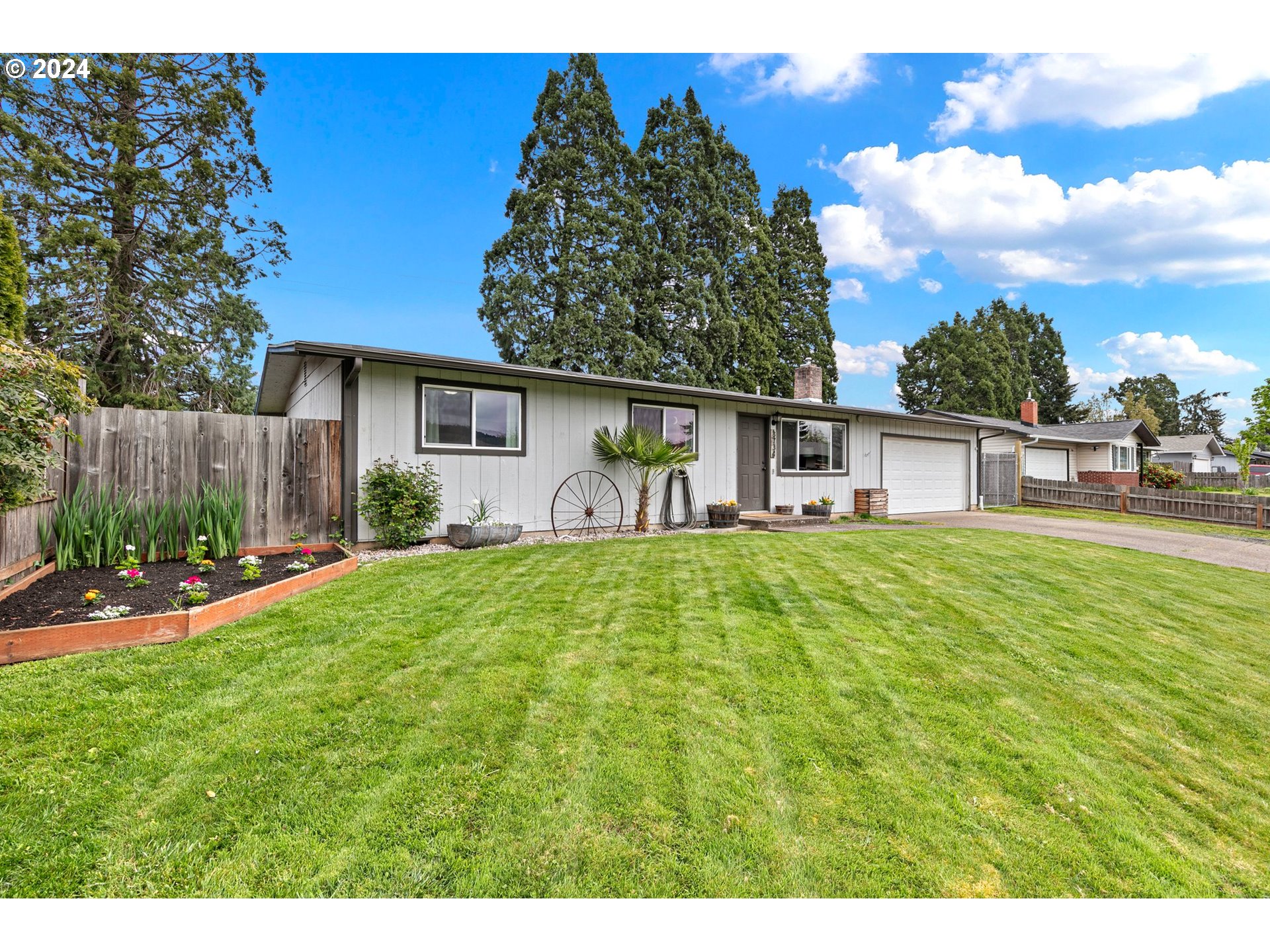 3734 Cherokee Drive Springfield, OR 97478 - Photo 3 of 39 a view of a house with a patio