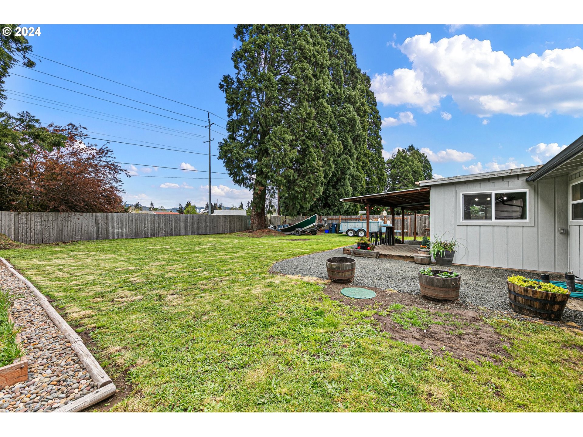 3734 Cherokee Drive Springfield, OR 97478 - Photo 34 of 39 a view of a backyard with sitting area