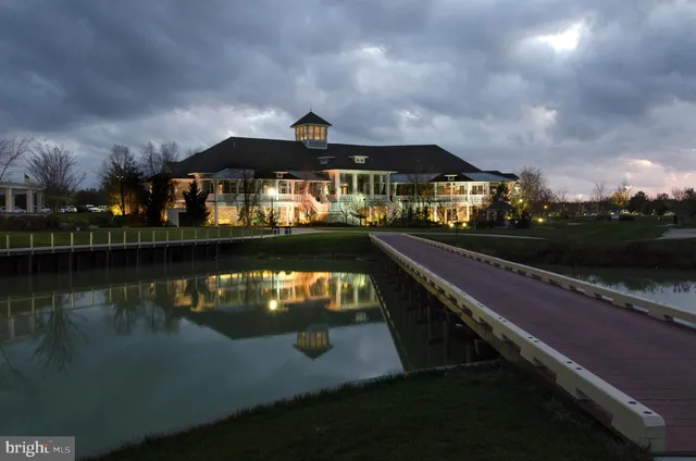 a view of a balcony with two chairs