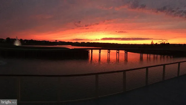 an aerial view of a house with a ocean view