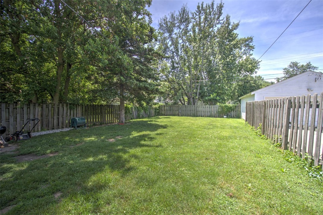 739 West Cushing Street Decatur, IL 62526 - Photo 26 of 28 a view of a backyard with a trees