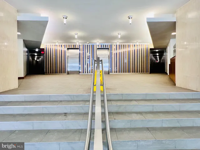 a view of a living room with furniture