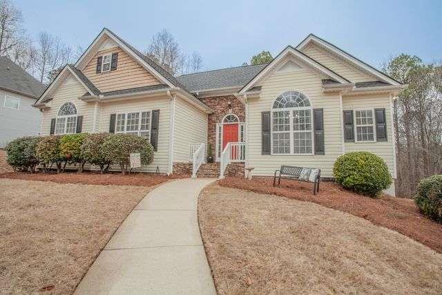 265 Creekside Way Hiram, GA 30141 - Photo 1 of 1 a front view of a house with porch and garden