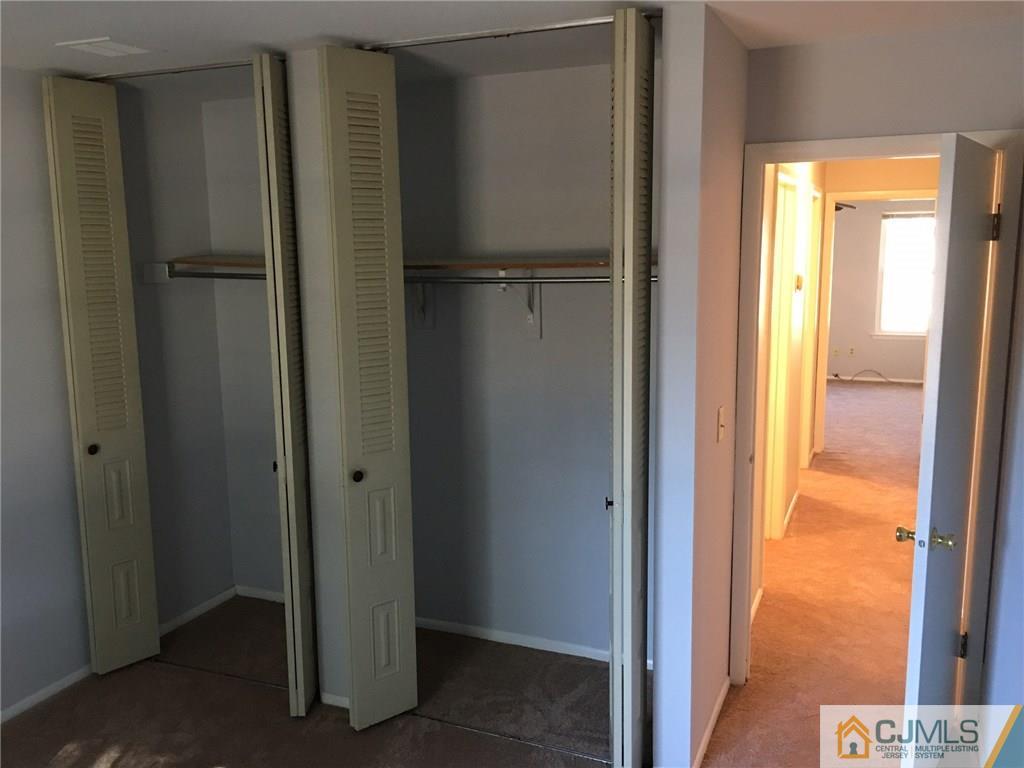 22 Woodbury Road Edison, NJ 08820 - Photo 17 of 25 a view of closet area